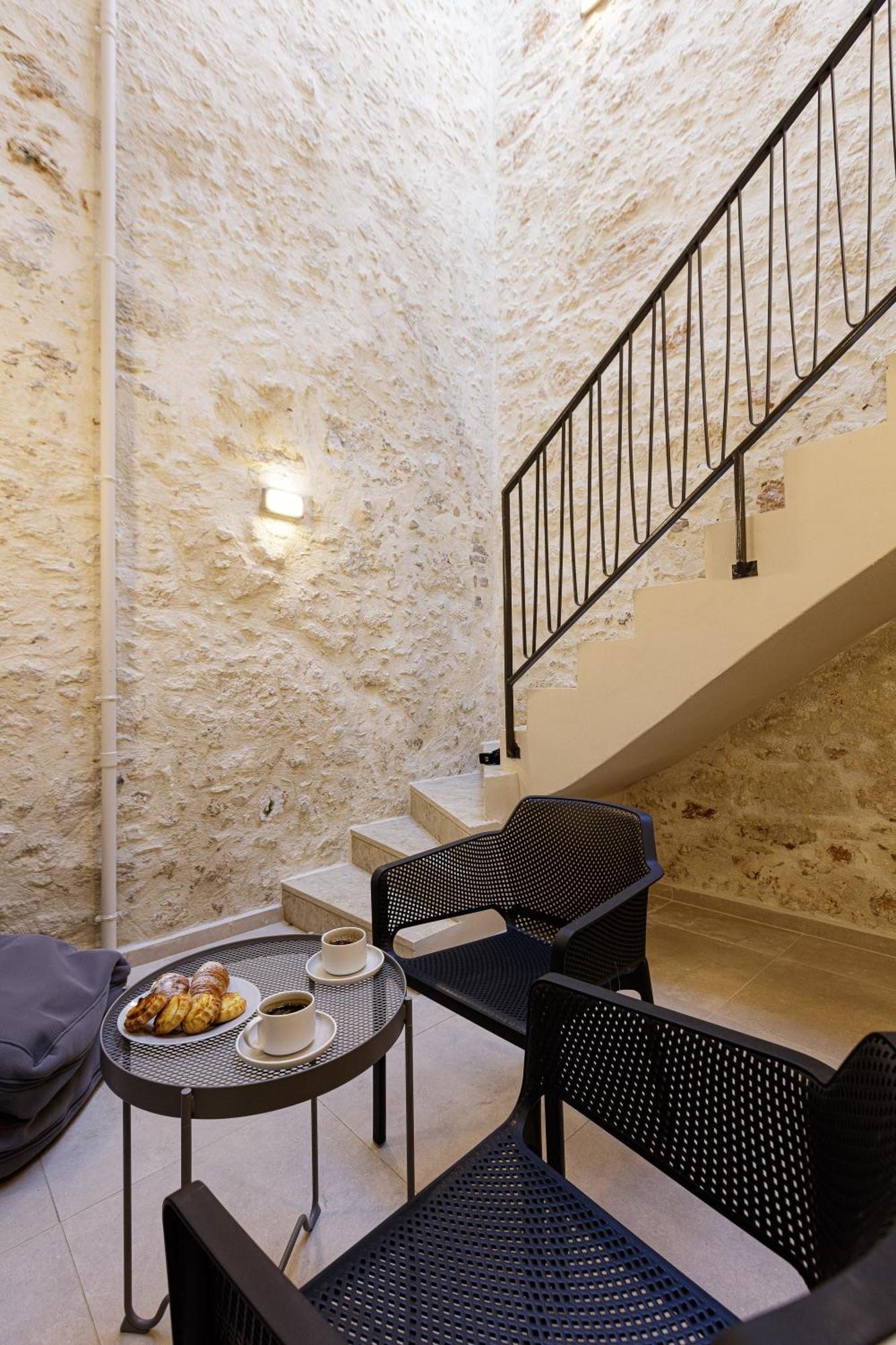 V77 Seafront Suites Rétino Habitación foto